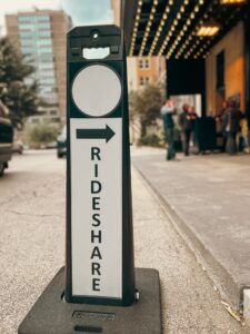 rideshare sign with arrow